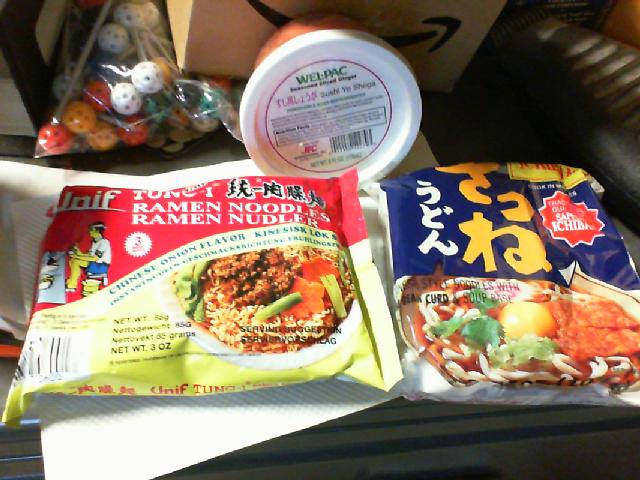 two packs ramen and one pickled ginger